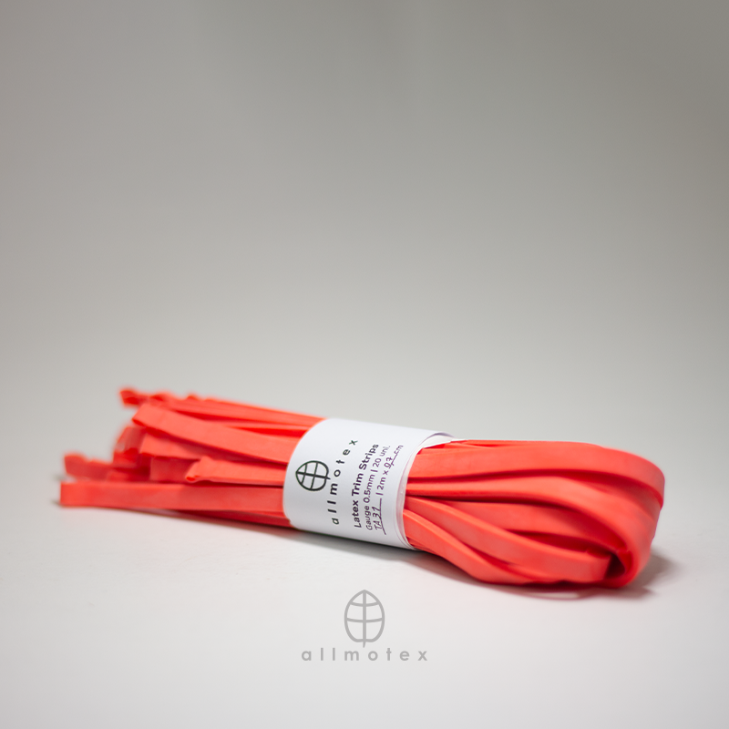 Atomic Tangerine Orange 0,7cm latex trim with allmotex label on a white background