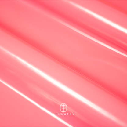 Close-up of fuchsia pink glossy latex with Allmotex logo.