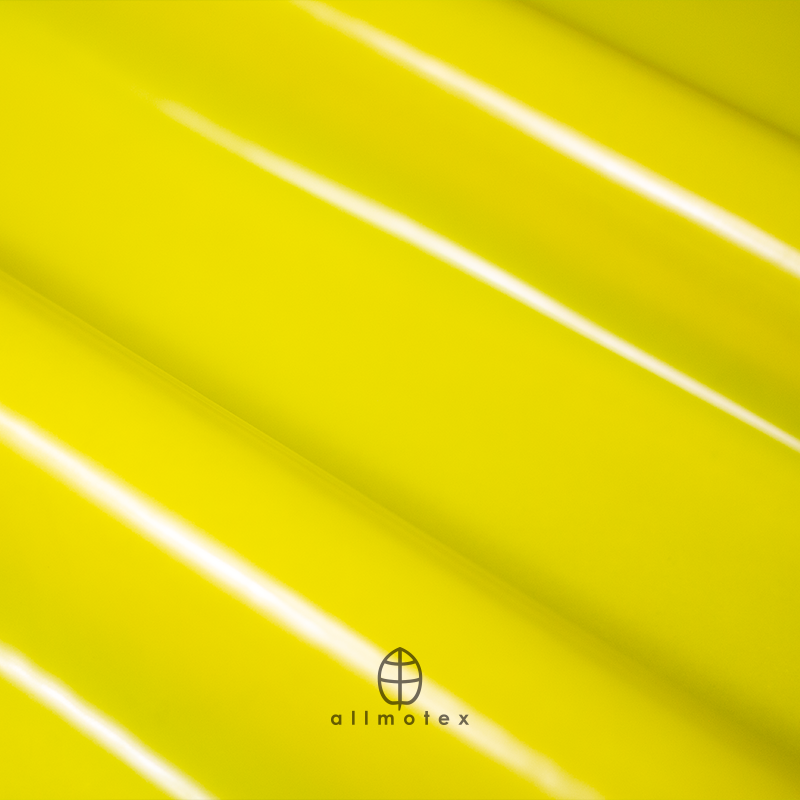 Close-up of yellow glossy latex with Allmotex logo.
